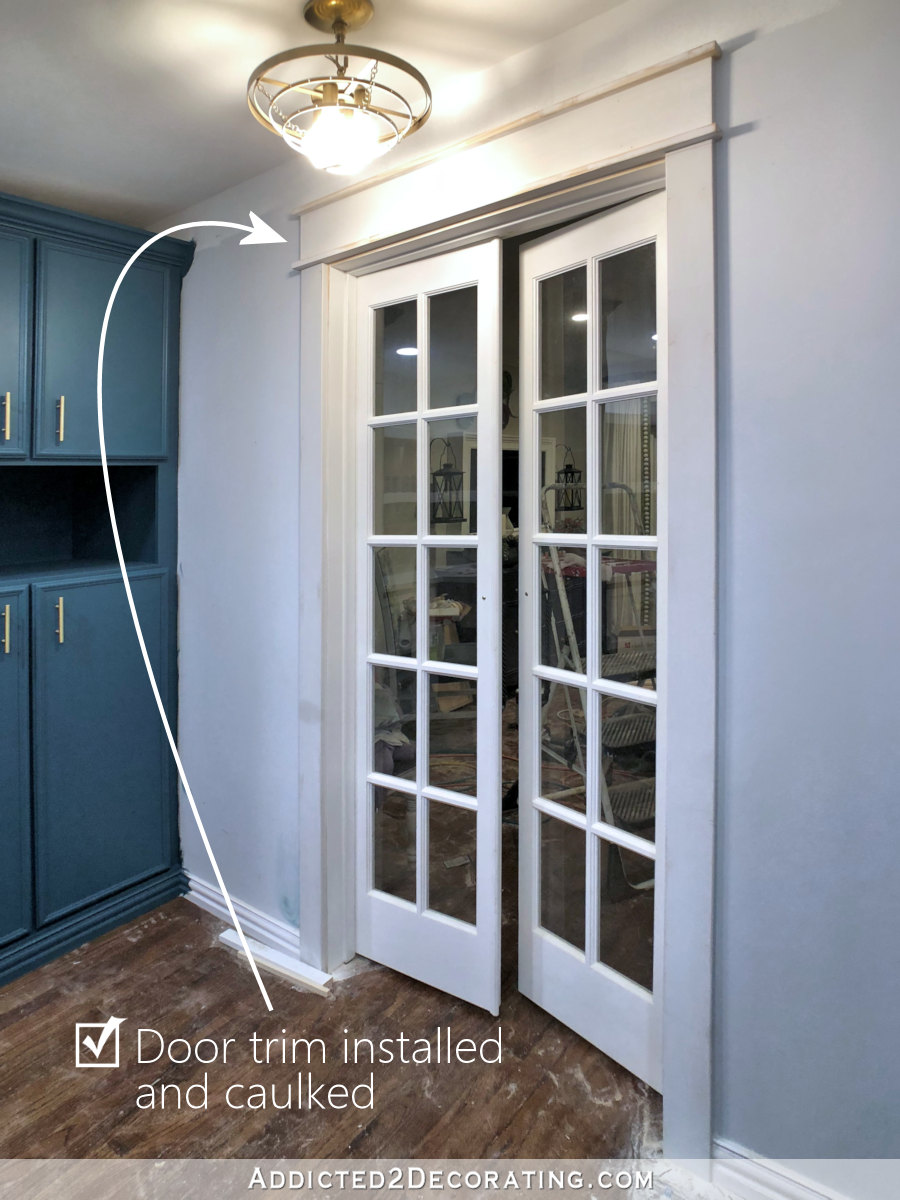 Pantry remodel progress -- door trim installed, sanded, caulked and ready for paint